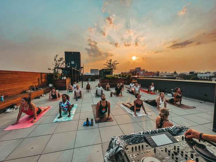 Take a Sunrise Yoga Class on a Rooftop